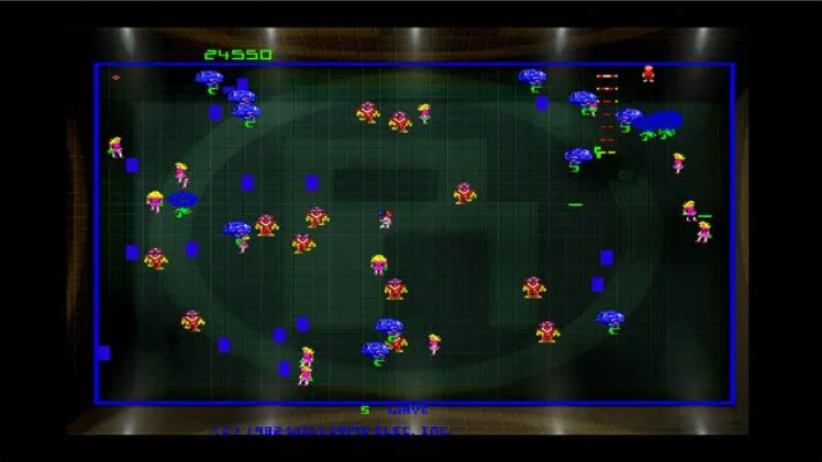 Robotron 2084 gameplay from the official Xbox Live Arcade release, representing the list's number-one game.